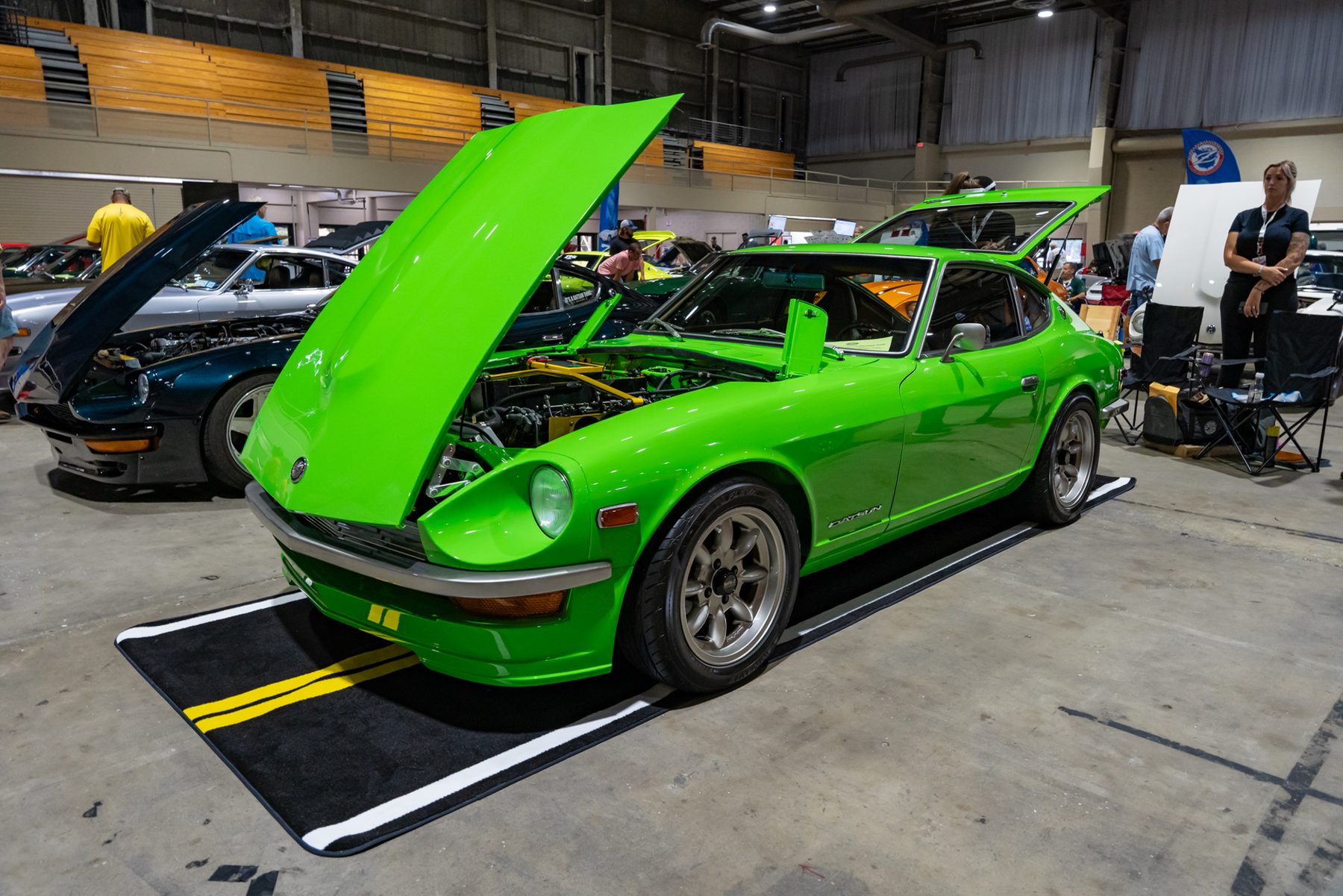 Lime, a bright green Datsun 240Z restored by SoFlo Z Club, on display with the hood raised at ZCON